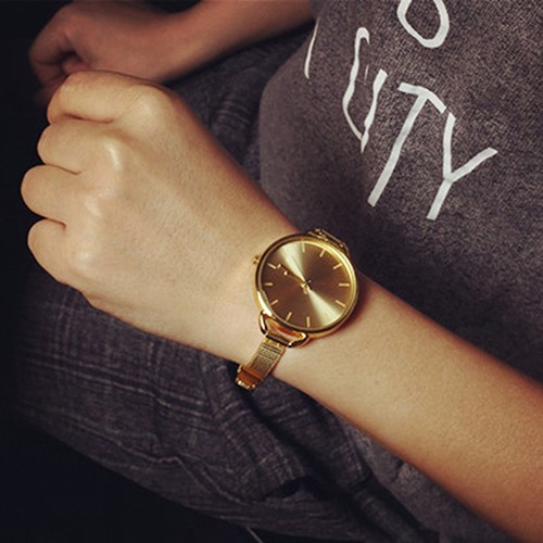 Đồng hồ đeo tay dây kim loại mỏng mặt tròn thanh lịch thời trang cho nữ