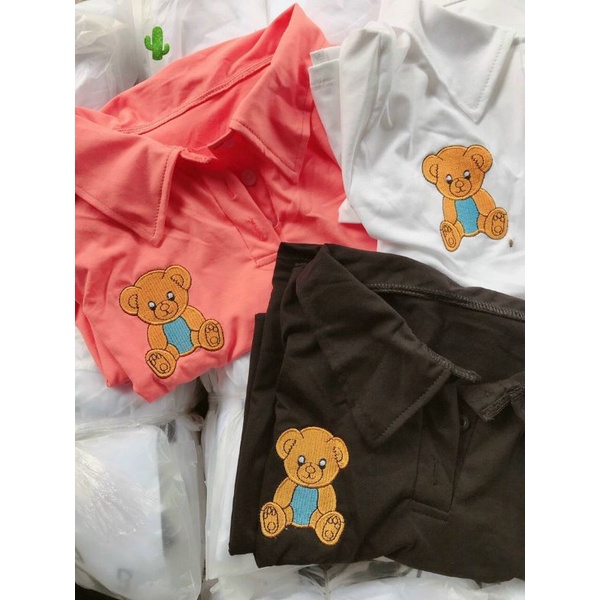 Đầm xuông cổ trụ thêu gấu