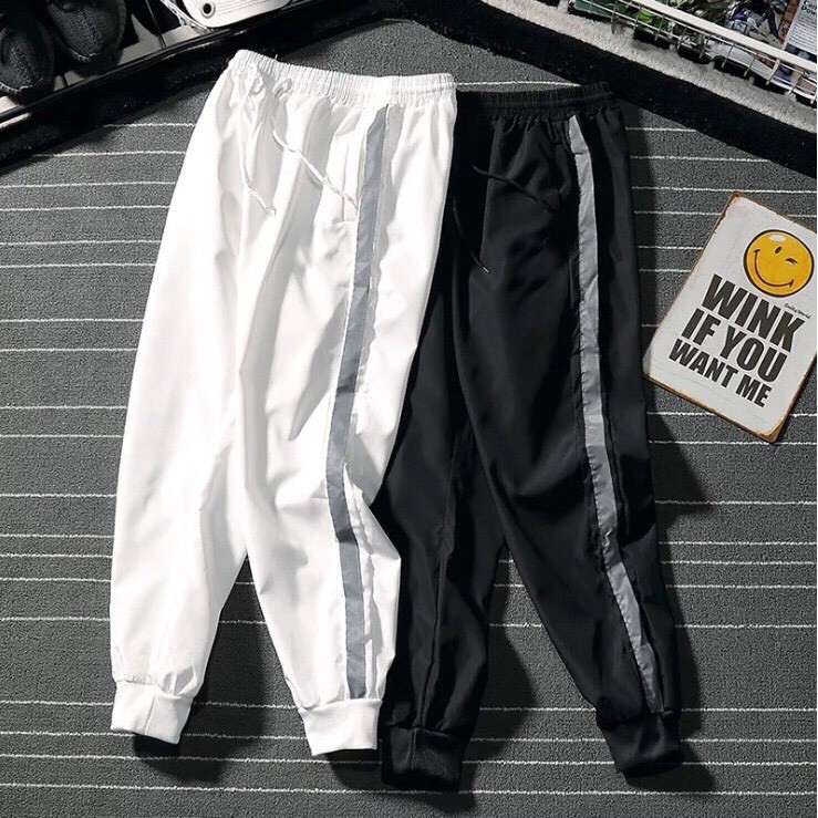 Quần jogger 1 vạch phản quang phát sáng : Chất dù size ( M - XXL ) 30kg -100kg