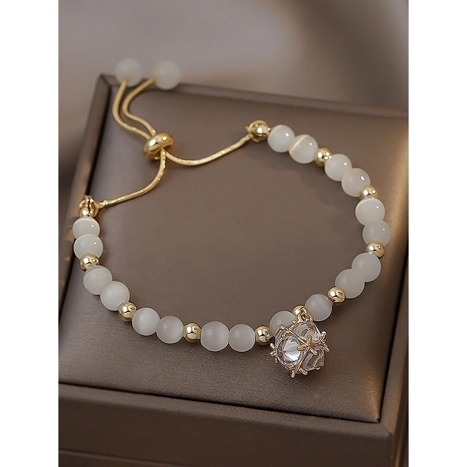 Vòng lắc tay nữ cườm đá Opal rút dây hàng Aut cao cấp
