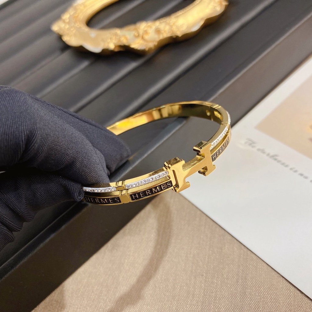 Vòng Tay Hermes Bằng Thép Titan Khắc Chữ H Thời Trang