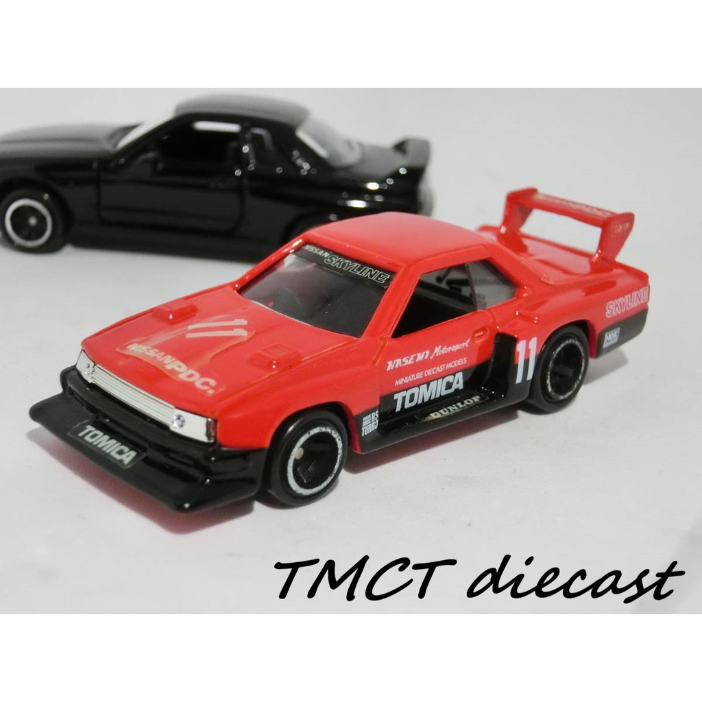 Mô hình 1/64 Tomica Nissan Skyline GT-R No.20 1999 (có gương - đèn nhựa) - Skyline Silhouette Formula Made in China