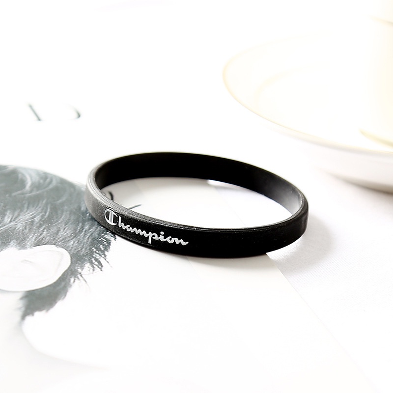 Vòng tay silicone mặt chữ Champion thời trang cho nam và nữ