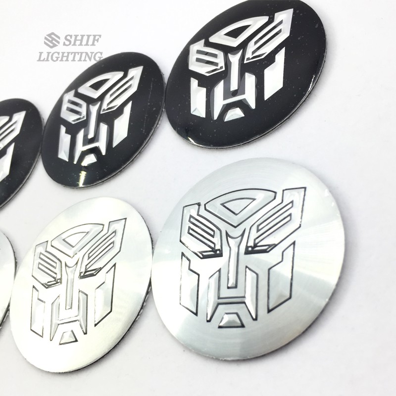 Bộ 4 miếng dán nắp giữa bánh xe hơi họa tiết Transformer 56mm