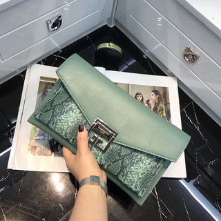 túi xách cầm ta da rắn dự tiệc