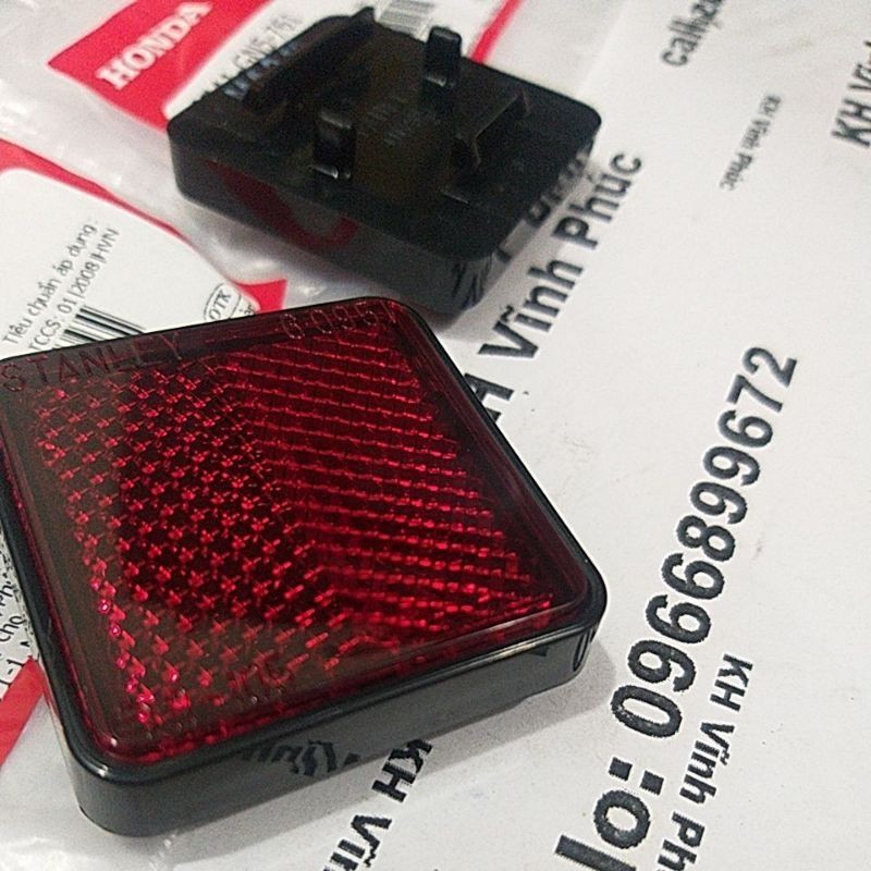 tấm phản quang gắn đuôi sau xe wave nhỏ chính hãng