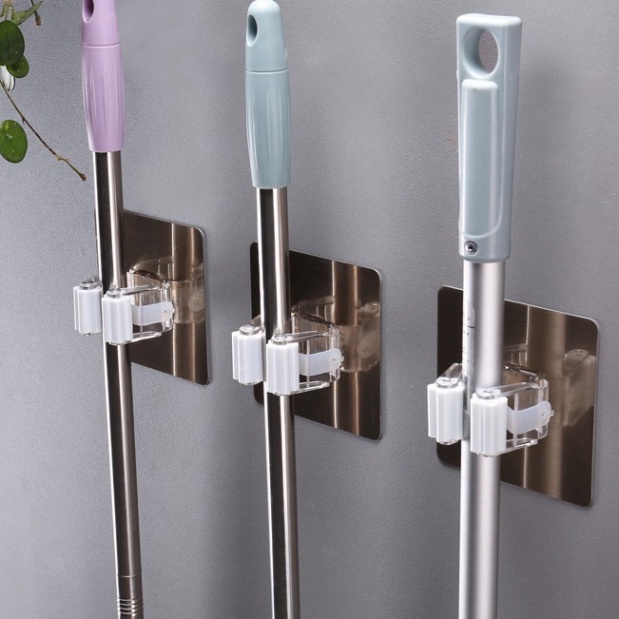 Kẹp chổi có móc dính tường chắc chắn kẹp các vật dụng treo trong nhà