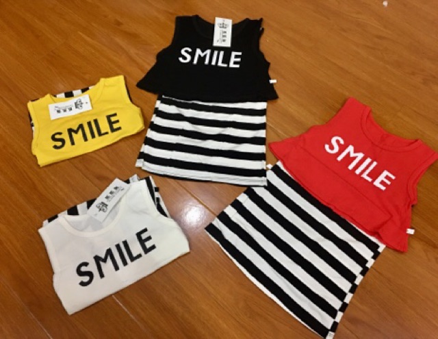 Set áo + váy in SMILE cho bé gái từ 10-17kg mã V1052