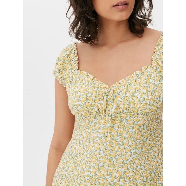 Đầm hoa nhí tay nhún xuất dư xịn