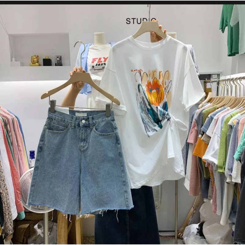 Quần bò ngố xanh trơn cắt gấu tua