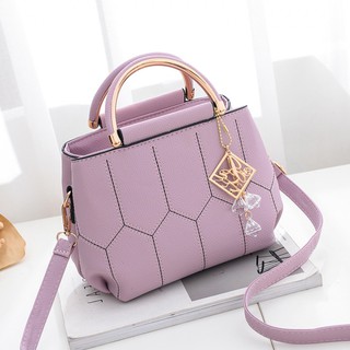 Túi xách nữ đeo chéo trẻ trung hiện đại, phong cách Hàn Quốc có màu hồng tím và đen
