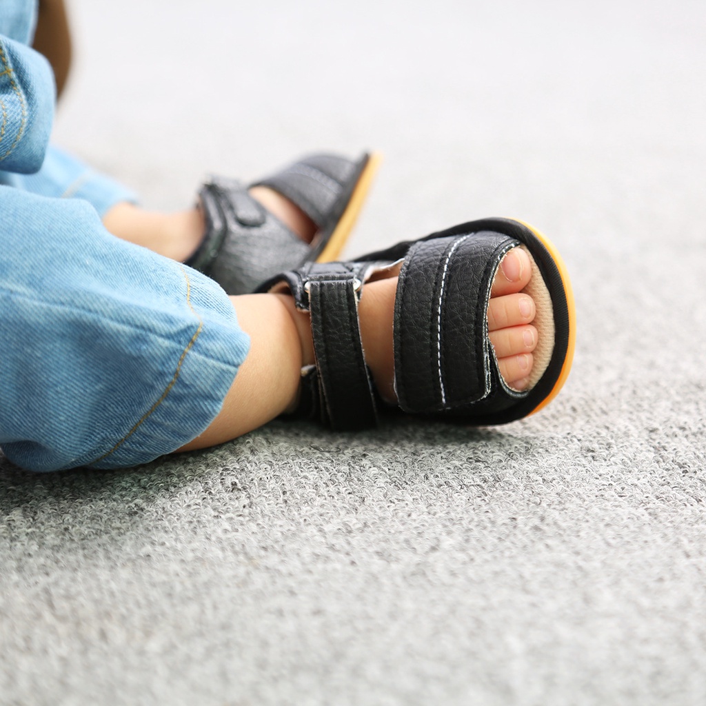Giày tập đi cho bé trai bé gái đế cao su thiết kế chống trơn trượt chất da mềm mại có lót êm ái