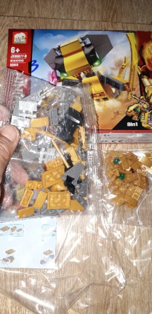 Lắp ráp 1 hộp LegoNinjag Rồng Vàng JX80077 có nhiều chi tiết bằng nhựa ABS