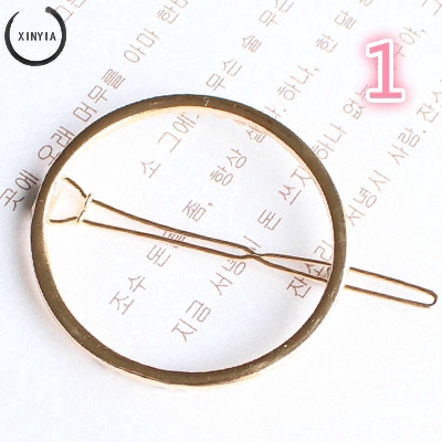 Kẹp tóc hình tam giác màu vàng