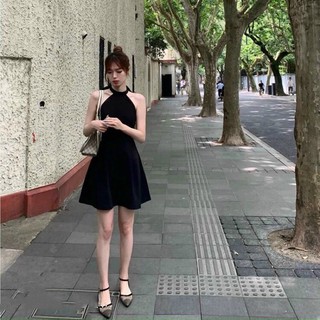 Đầm xoè đen cổ yếm thắt nơ hở lưng (ảnh thật)