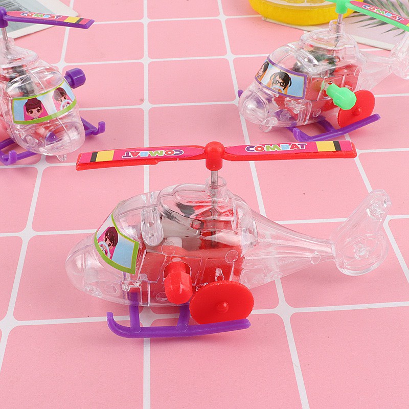 Trực thăng mini trong suốt lên dây cót cho bé