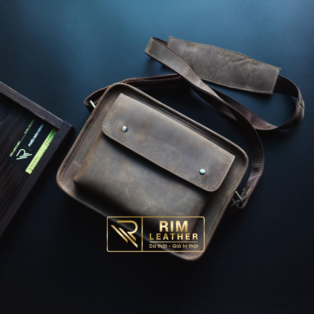 Túi đeo chéo dáng ngang. Bảo hành 2 năm