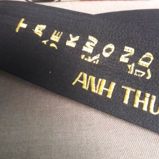 Đai đen Taekwondo có thêu tên.