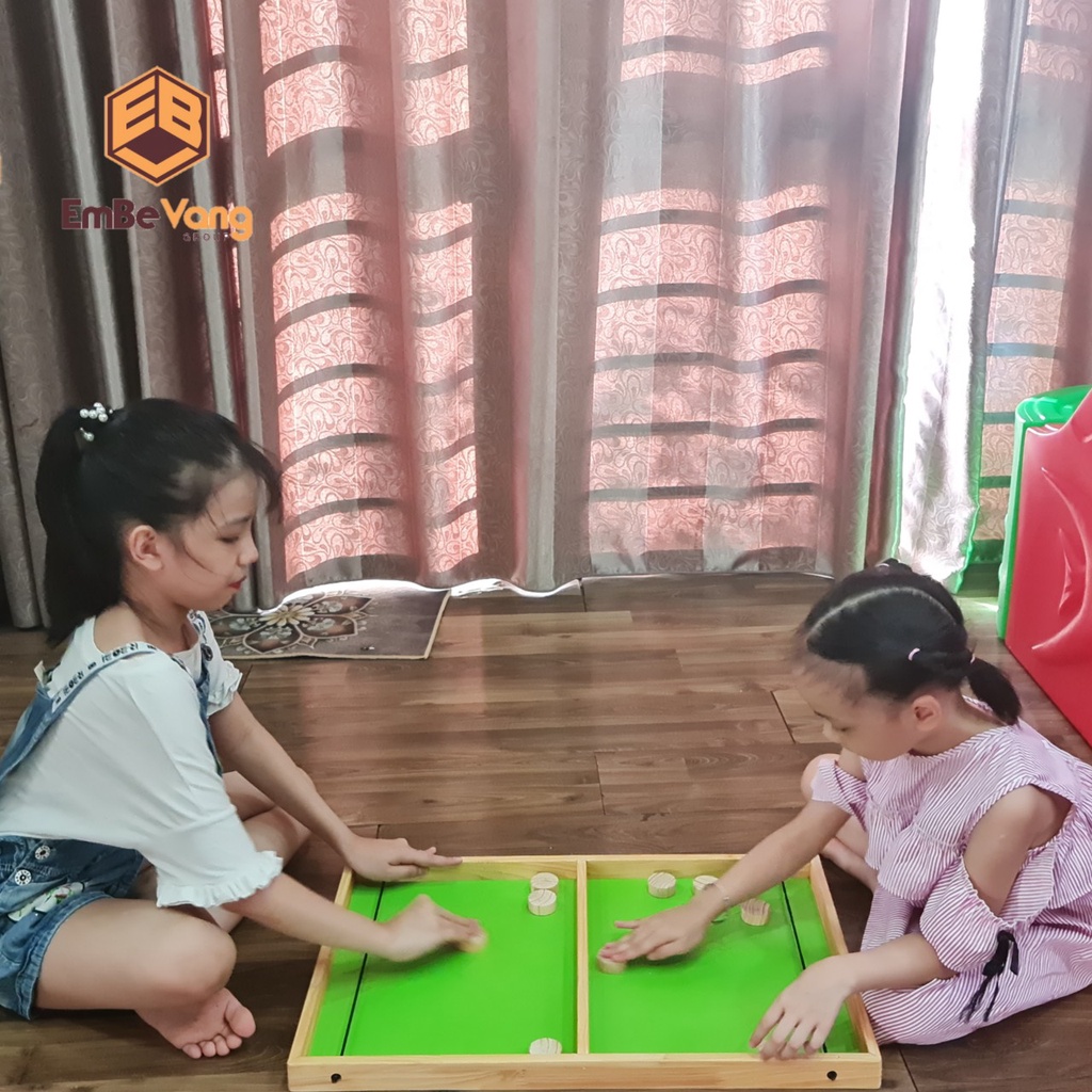 Cờ búng - Bàn cờ búng xuyên lỗ đối kháng - Gỗ An Toàn Em Bé Vàng
