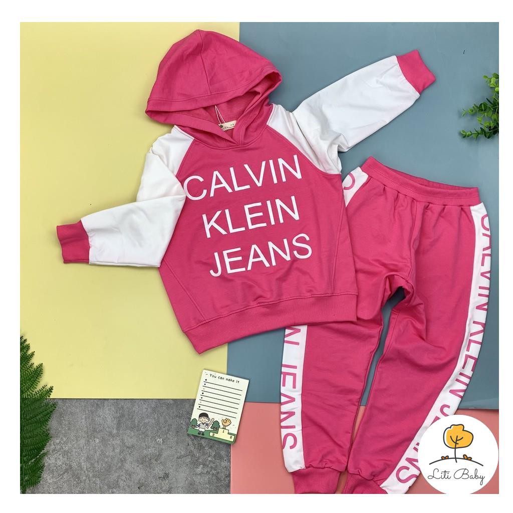 Bộ nỉ da cá thu đông dài tay áo có mũ in chữ bé gái size 9-14T, cho bạn từ 29-40kg. Chât nỉ da cá đẹp, đanh tay, ấm áp