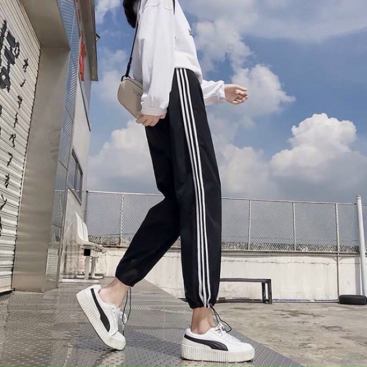 Quần thể thao 3 sọc nữ ống rộng viền kẻ sọc trắng có dây rút kéo unisex vải umi co giãn QN2