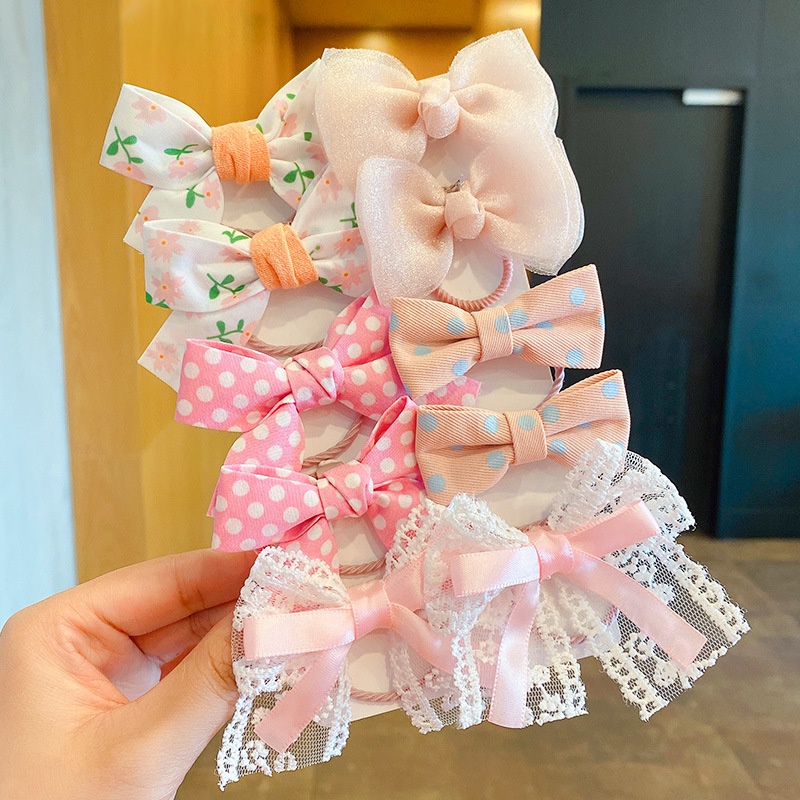 Set 10 Dây Cột Tóc Co Giãn Đính Nơ Hoạt Hình Dễ Thương Cho Bé Gái