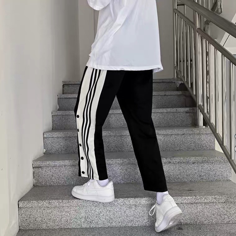 Quần hip-hop nam nữ ống rộng có sọc thời trang