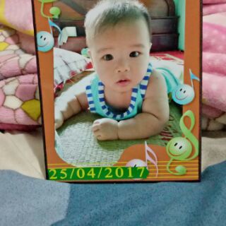 Hình lịch ép gỗ đổ keo bóng.