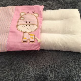 Gối mátxa trẻ em