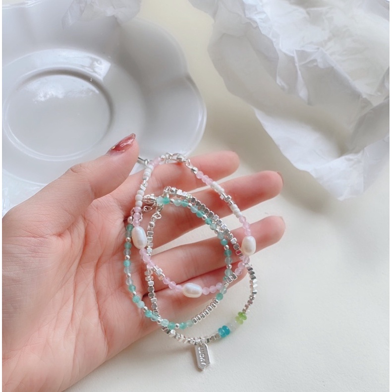 Vòng tay hạt cườm phối charm pastel xinh xắn