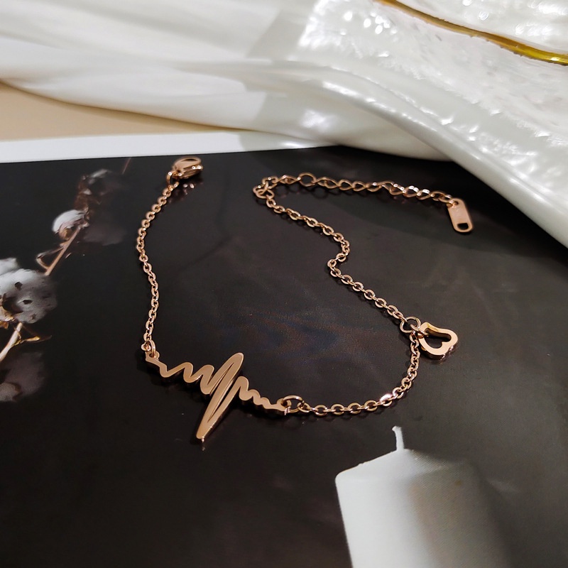 Lắc chân titan nhịp tim TT953  CAM KẾT KHÔNG BAY MÀU - BẢO HÀNH 12 THÁNG