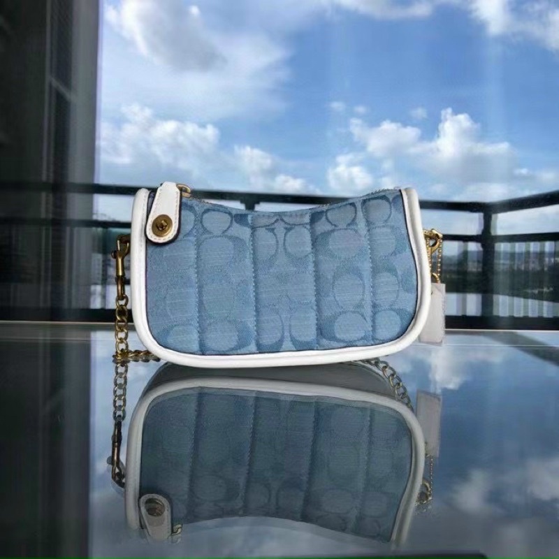 Túi Coach kẹp nách sang chảnh
