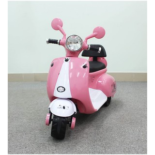 XE MÁY ĐIỆN VESPA CHÂN CÚN MÀU HỒNG CHO BÉ