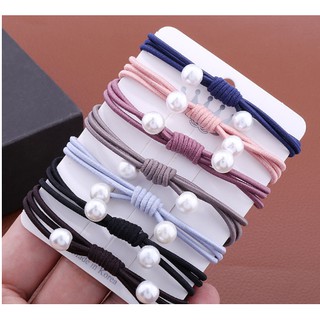 CỘT TÓC ĐÍNH HẠT TRAI GIẢ NƠ TRƠN