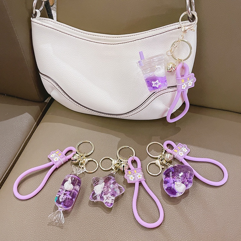 Móc Khóa Hình Thiên Nga Hoạt Hình Nổi Trên Nước Màu Tím Dễ Thương