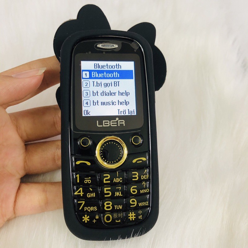 Điện thoại mini tặng ốp chuột micky nhiều màu.