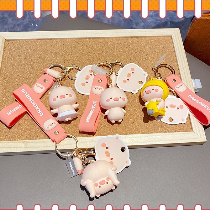 Móc khóa bé Heo đi xe máy