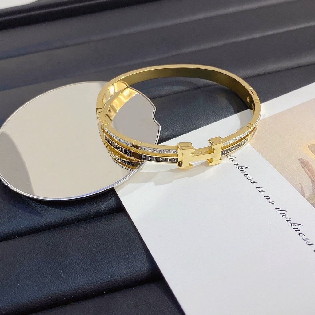 Vòng Tay Hermes Bằng Thép Titan Khắc Chữ H Thời Trang