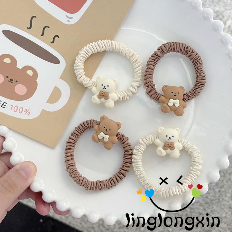 Dây buộc tóc hình gấu dễ thương cho bé gái