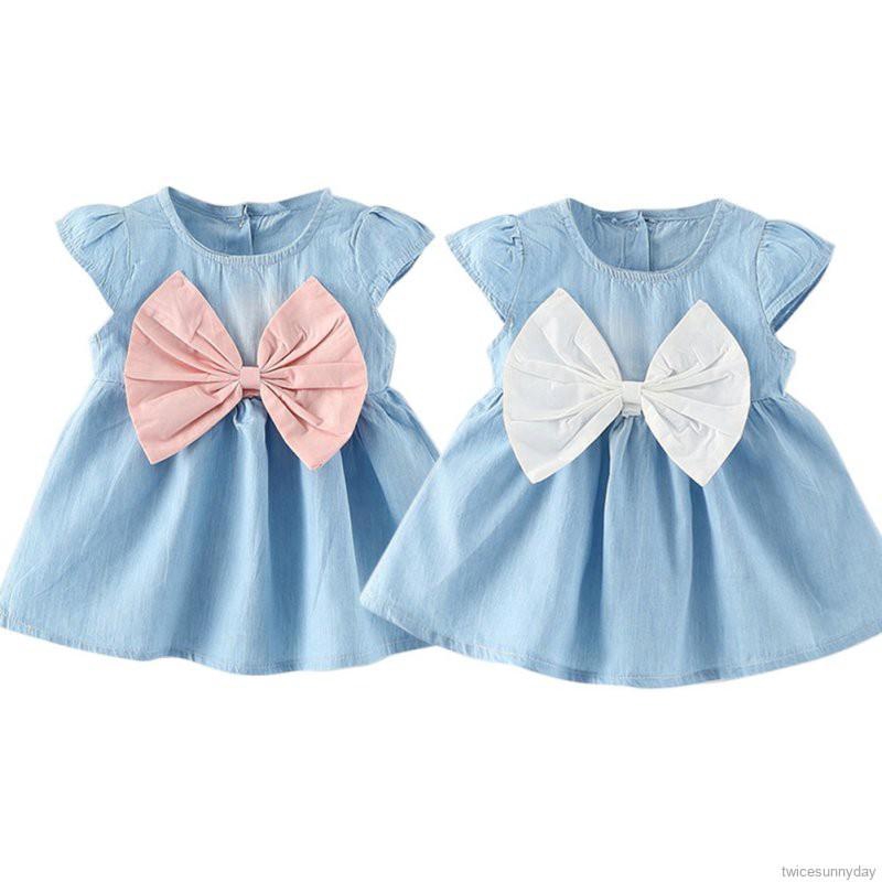 Đầm xòe ngắn tay đính nơ xinh xắn dành cho bé gái