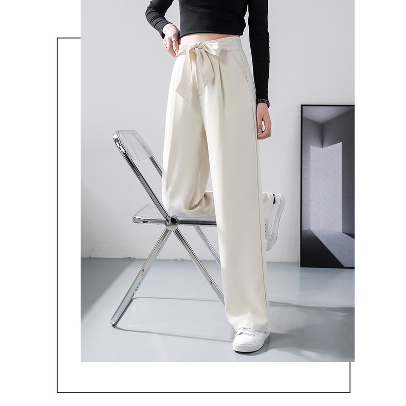 Quần ống rộng nơ bản to cách điệu