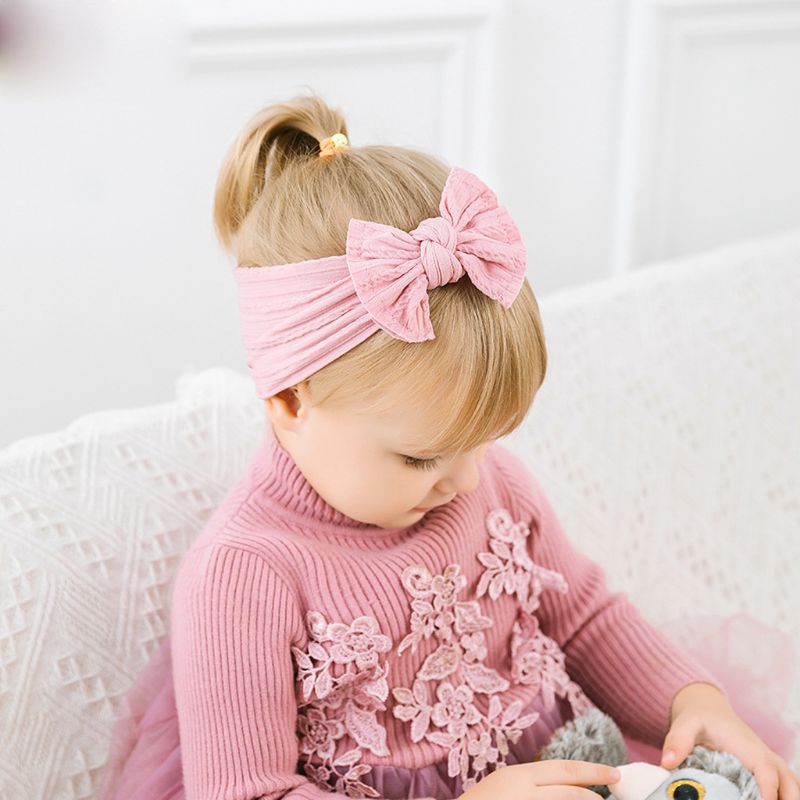 Băng đô len đan đính nơ xinh xắn cho bé gái