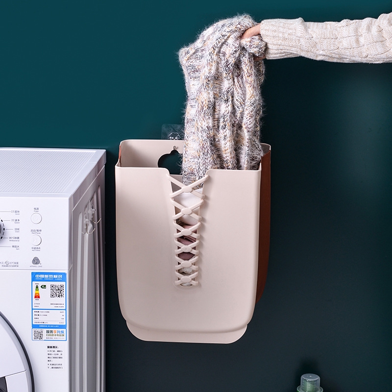 Collapsible wall mounted laundry basket