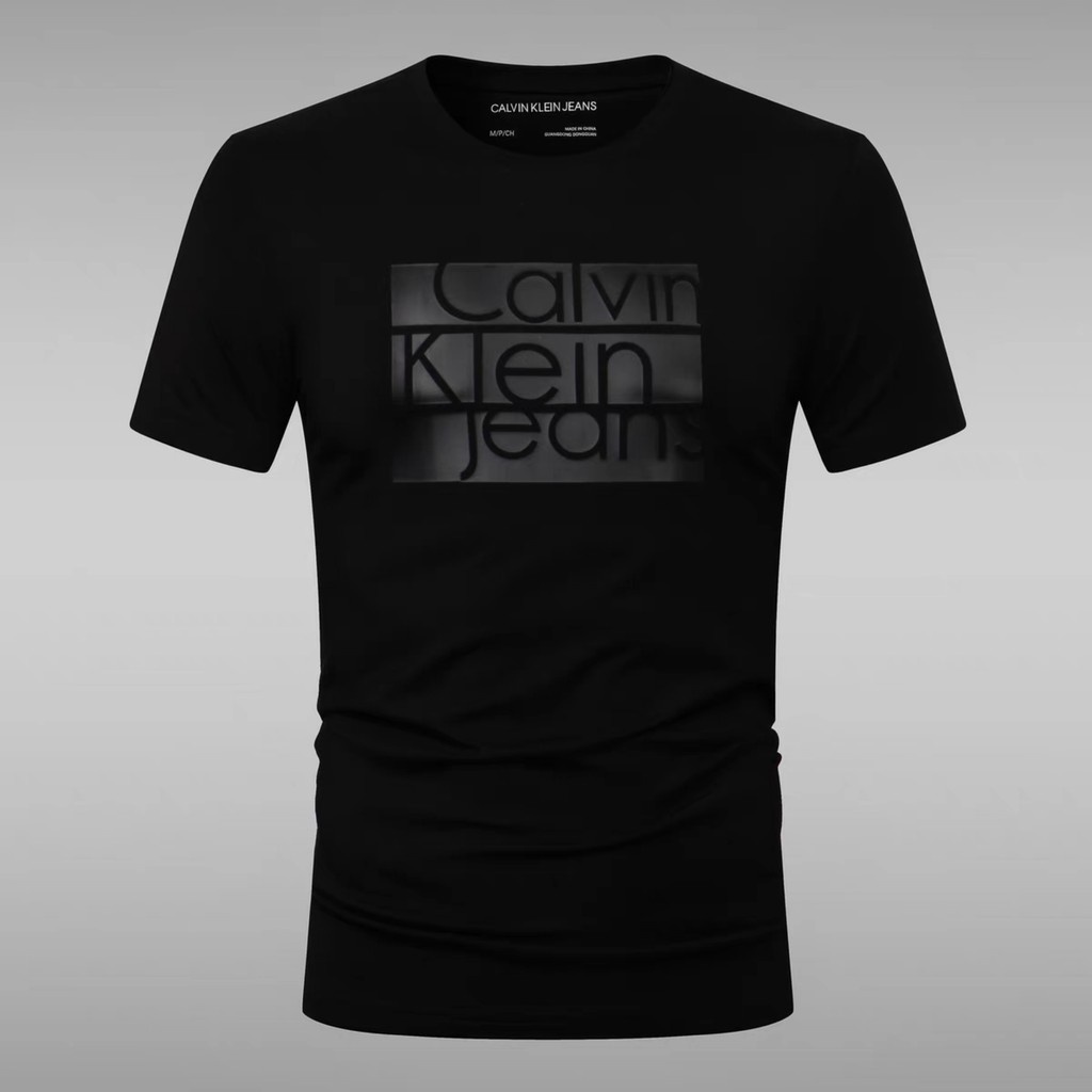 Áo Thun Ngắn Tay Cổ Tròn In Chữ Calvin Klein Cá Tính Cho Nam