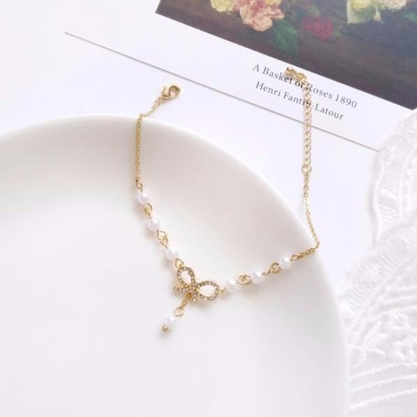 Vòng Tay Mạ Vàng Hình Nơ Đính Ngọc Trai Giả Xinh Xắn Cho Nữ