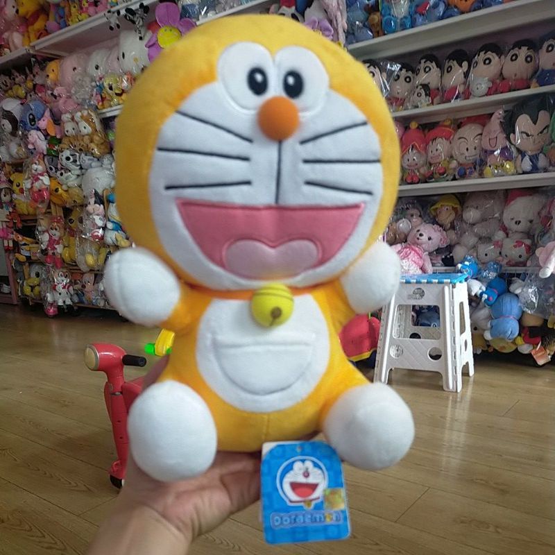 Gấu bông mèo máy Đôrêmon mới 99%