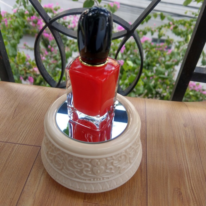 Đế xoay có led dây cót xoay phát nhạc - DX010