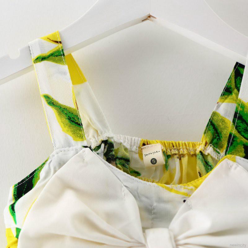 Đầm xòe in trái cây đính nơ đáng yêu cho bé gái