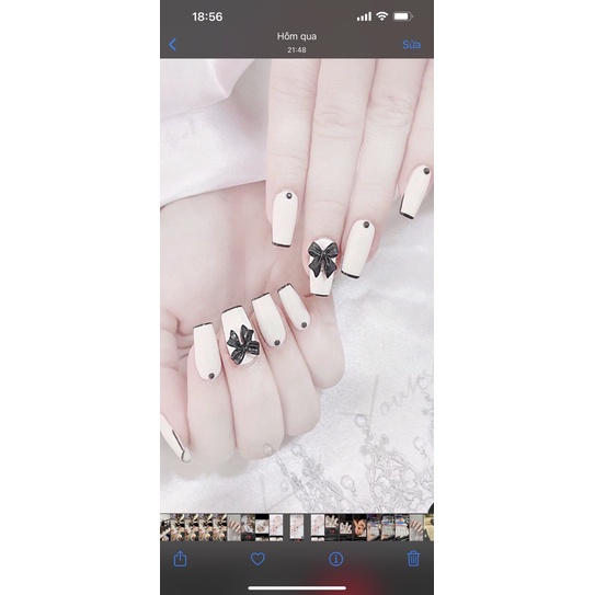 Nail box màu trắng gắn nơ tặng kèm keo và dũa