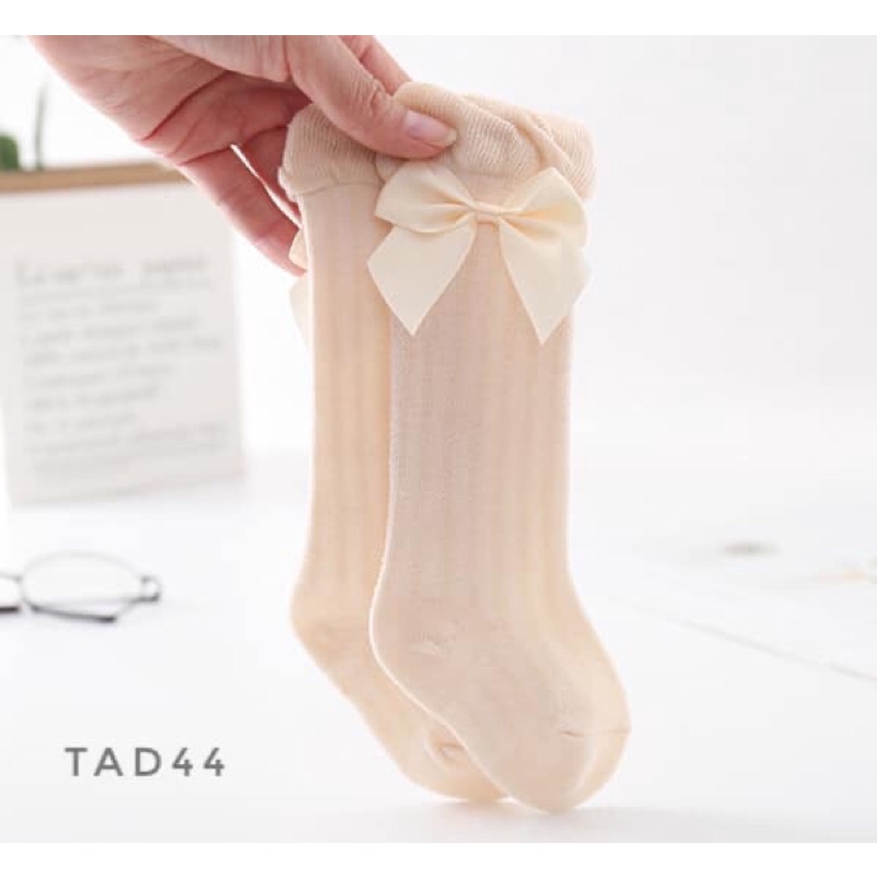 Tất lưới đùi đính nơ cho bé gái TAD44